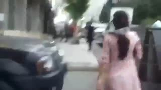 هنجار شکنی (قانون شکنی) یک دختر جوان در خیابان های شهر تهران