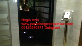 آبشار صخره ای و نورپردازی نمای ساختمان